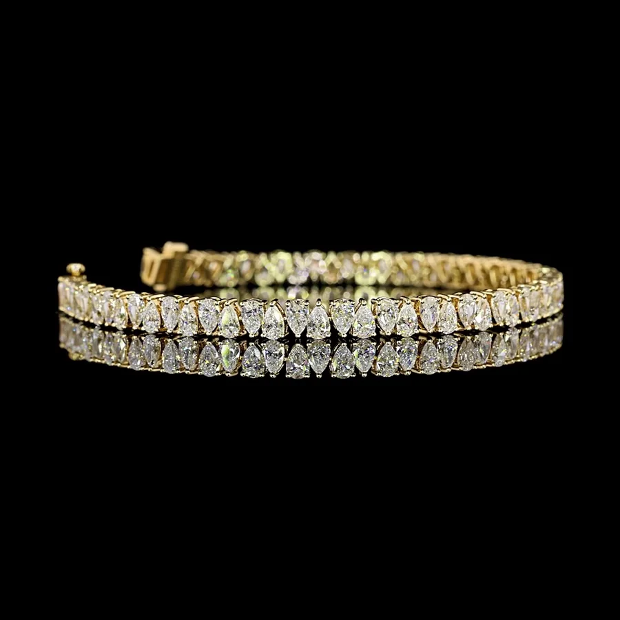 Pear Tennis Bracelet, 7 ct in 14k yellow gold